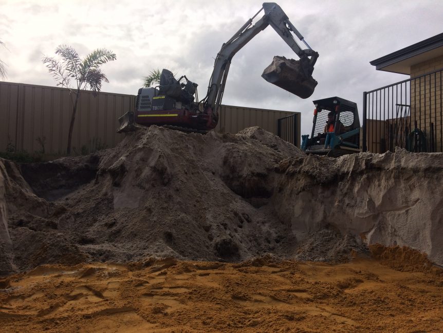 bobcat working in residential property