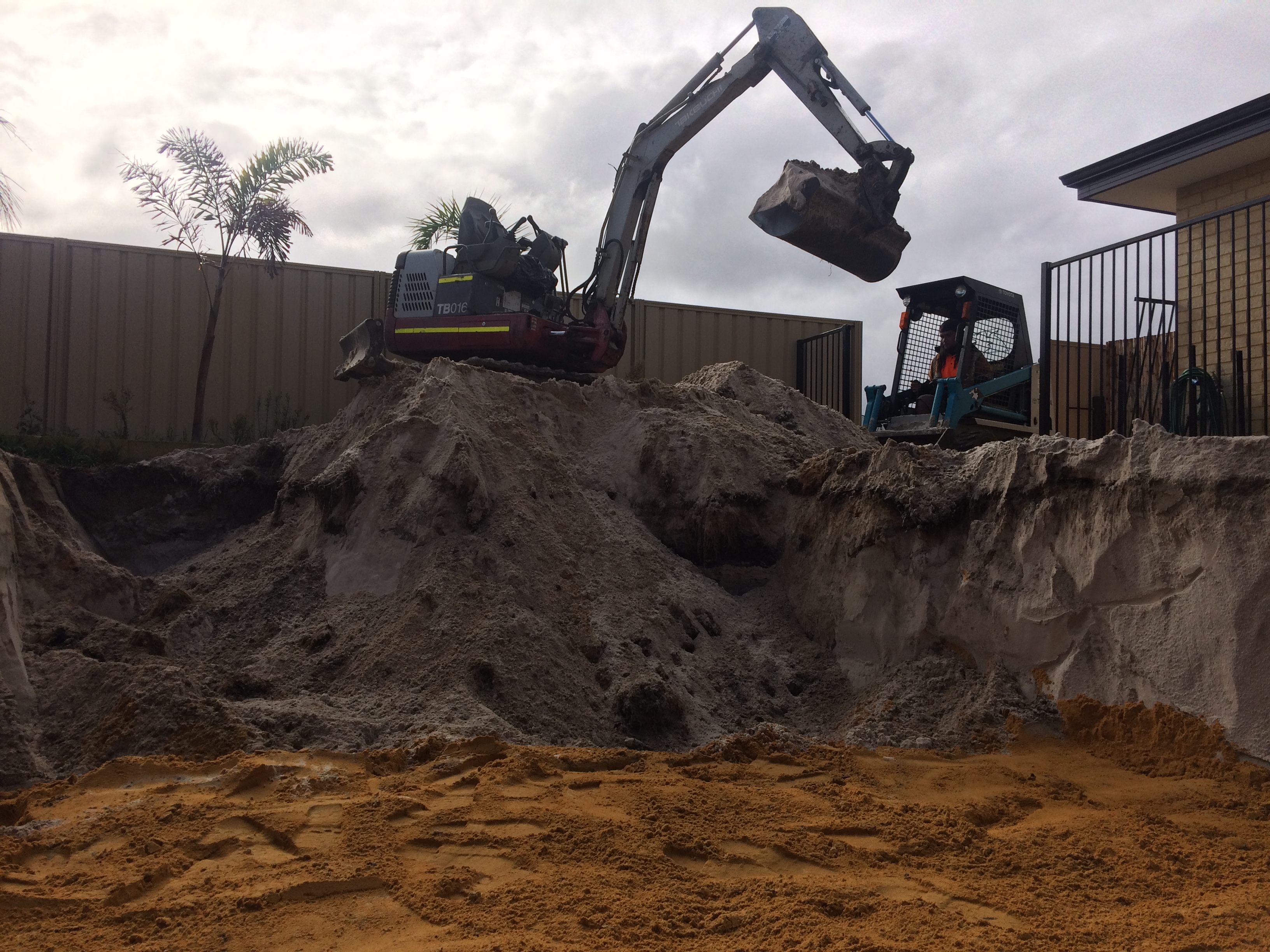 bobcat working in residential property