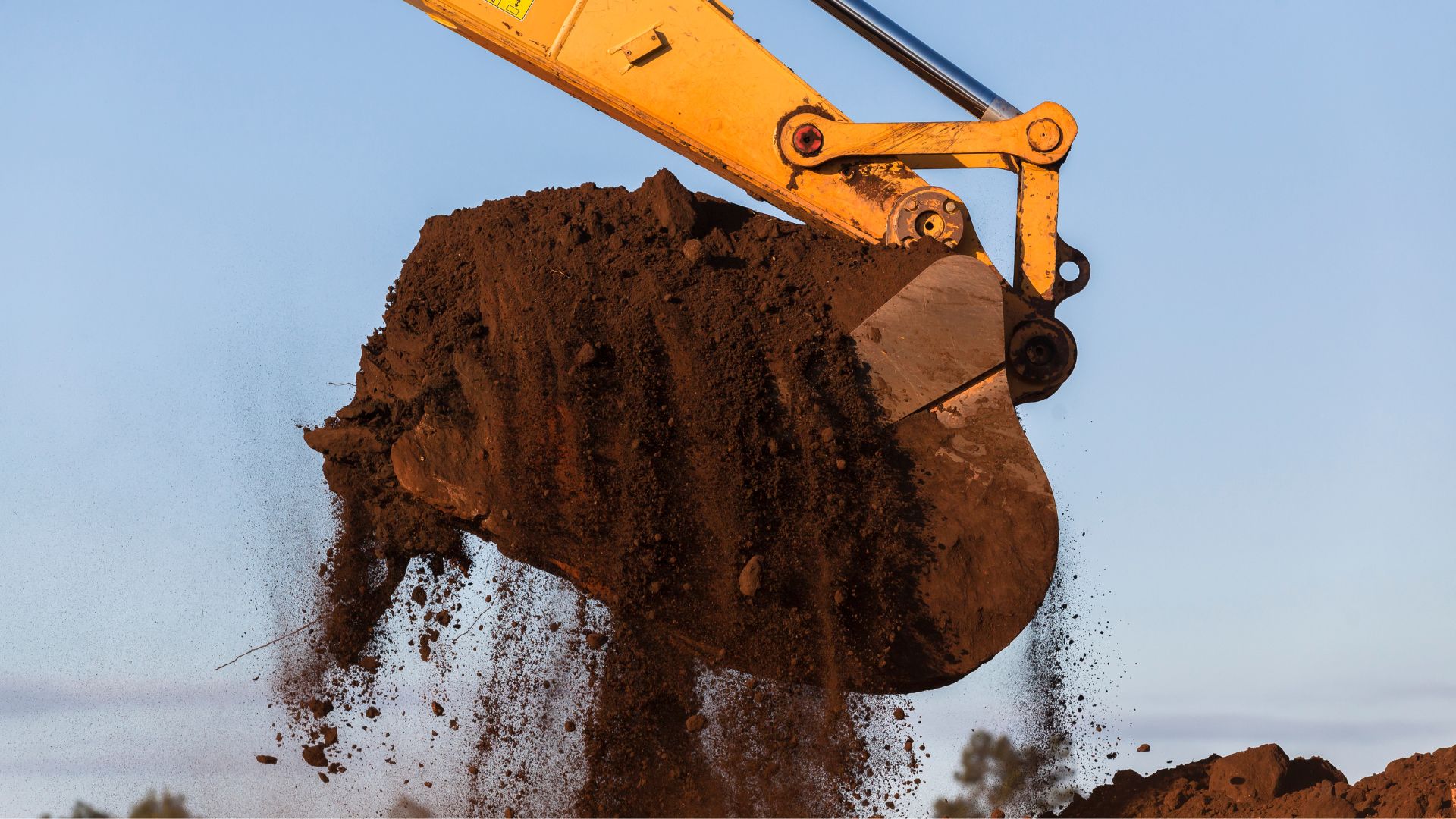 excavator moving dirt